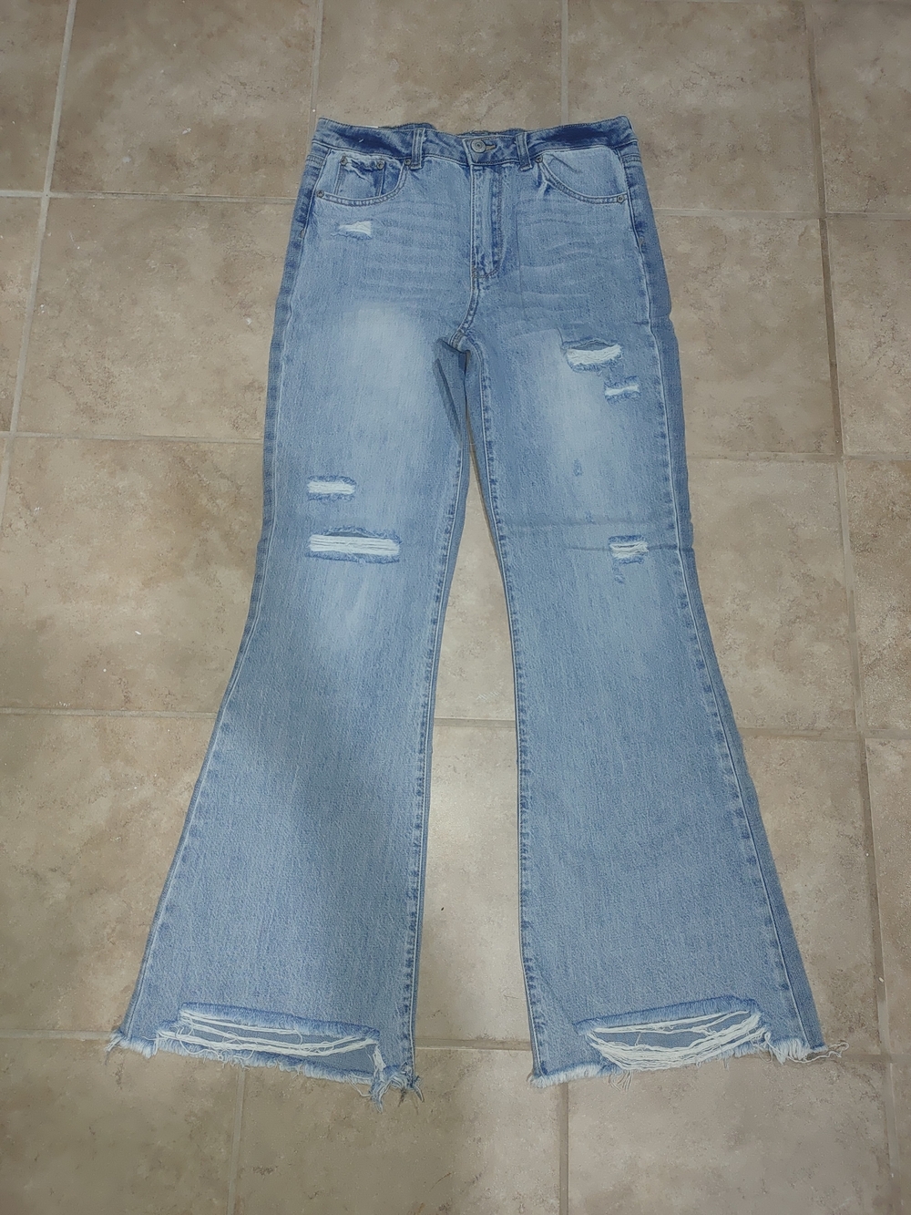 Light Blue Distressed Flare Jeans - Unbranded